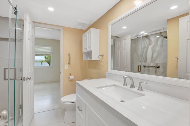 bathroom featuring tile patterned flooring, a shower stall, vanity, toilet, and recessed lighting