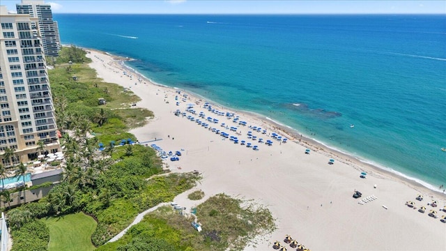 bird's eye view featuring a beach view and a water view