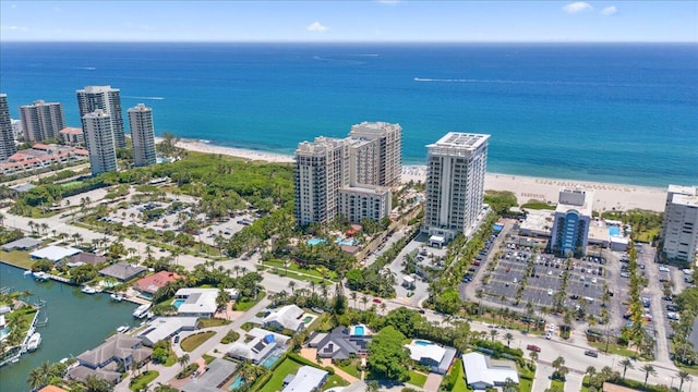 aerial view with a beach view and a water view