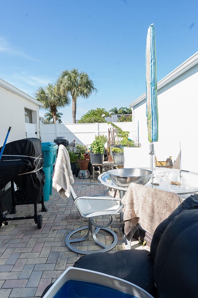 view of patio / terrace featuring a grill