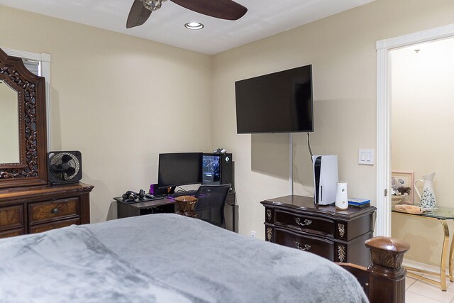 bedroom featuring light tile patterned floors and ceiling fan