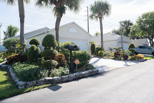 view of property exterior with a garage