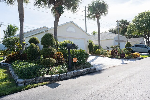 view of property exterior with a garage