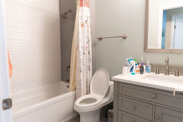 full bathroom featuring vanity, toilet, and shower / bath combo