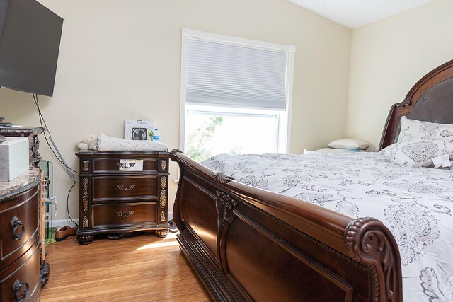 bedroom featuring light hardwood / wood-style flooring