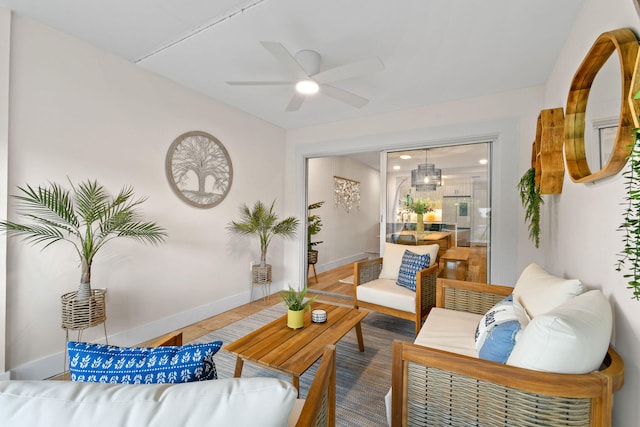 living room with ceiling fan