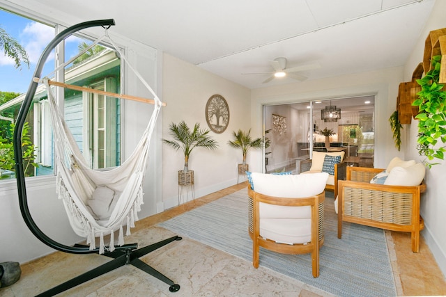 living room with ceiling fan