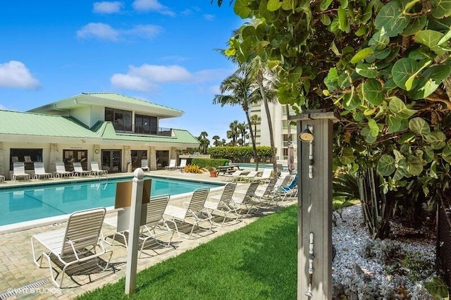 view of pool featuring a patio area