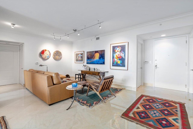 living room with crown molding and track lighting