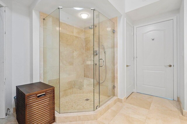 bedroom featuring hardwood / wood-style floors, a closet, ceiling fan, and ornamental molding