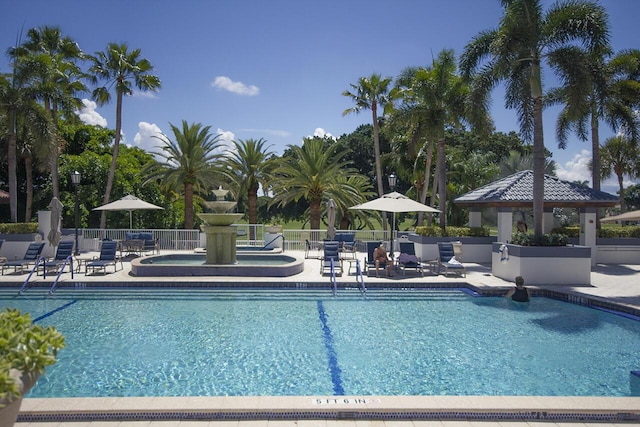 view of pool featuring a gazebo and a patio