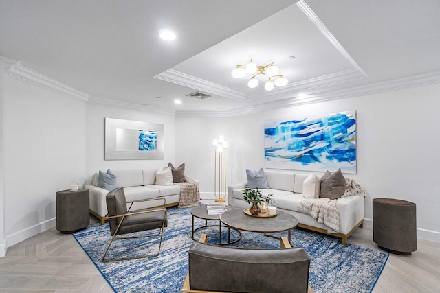 living room with ornamental molding and a raised ceiling