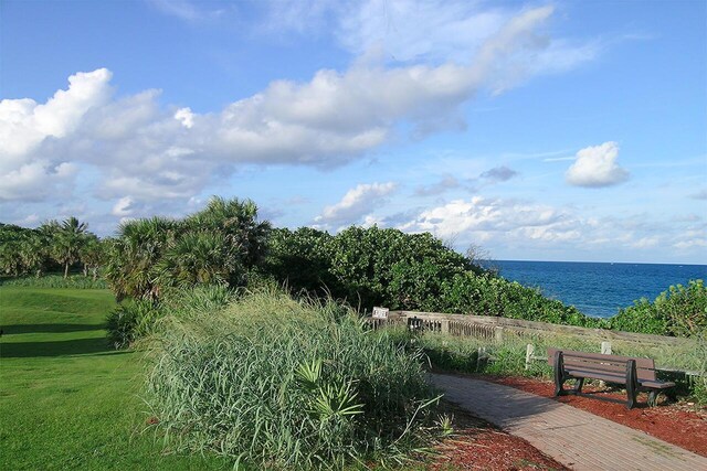 view of home's community featuring a yard