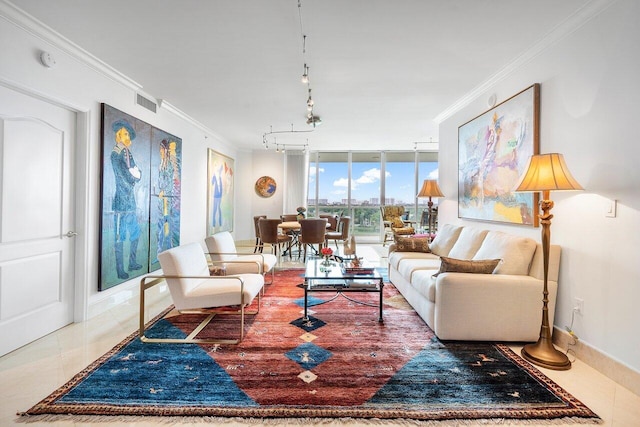 living room featuring expansive windows, ornamental molding, and track lighting