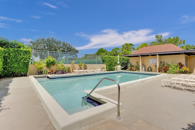 view of pool with a patio