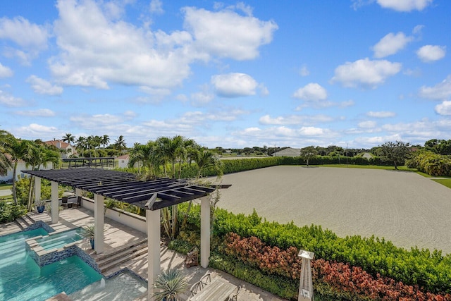 surrounding community with a patio and a pergola