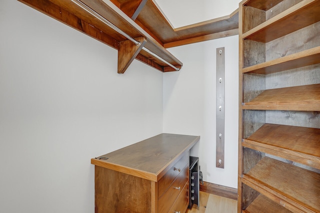 walk in closet featuring light wood-type flooring