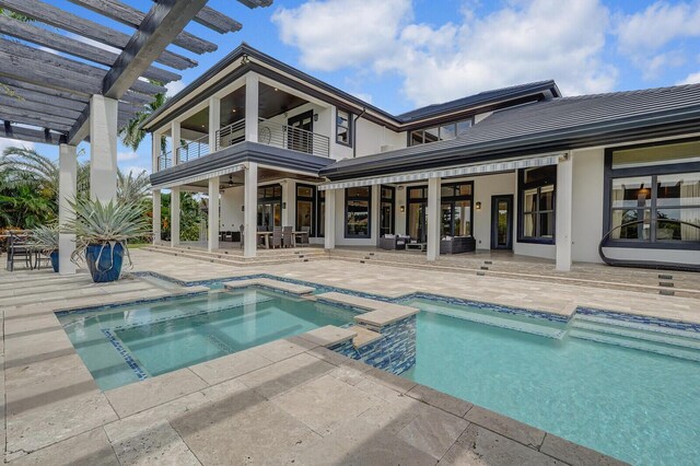 exterior space featuring a pergola and a patio area