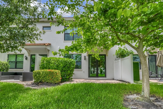 exterior space with a front yard