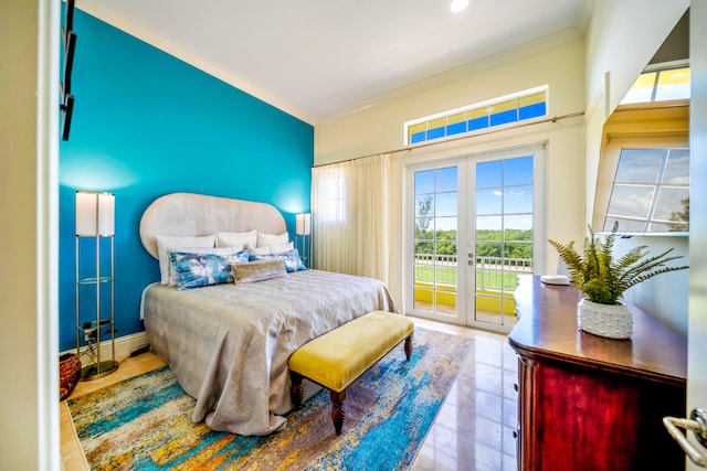 bedroom featuring ornamental molding, french doors, and access to outside