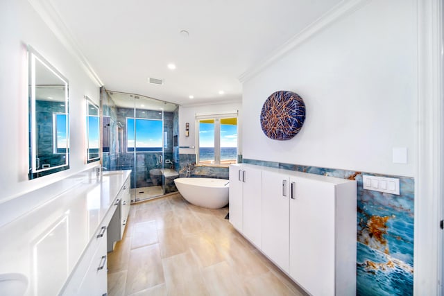 bathroom featuring tile walls, shower with separate bathtub, vanity, and crown molding