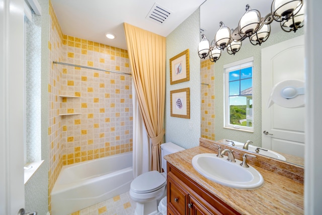 full bathroom featuring a notable chandelier, vanity, toilet, and shower / bathtub combination with curtain