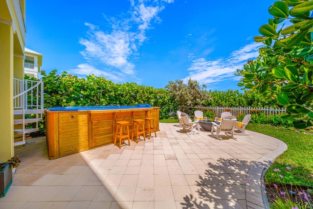 view of patio / terrace featuring a fire pit