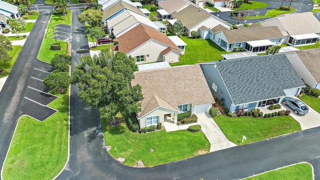 single story home with a lawn and a garage