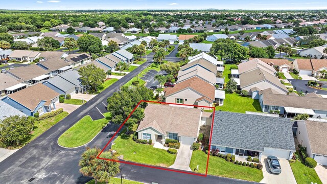 381 NW Sherry Ln, Port Saint Lucie, FL 34986 - aerial view of residential area featuring property parcel outlined