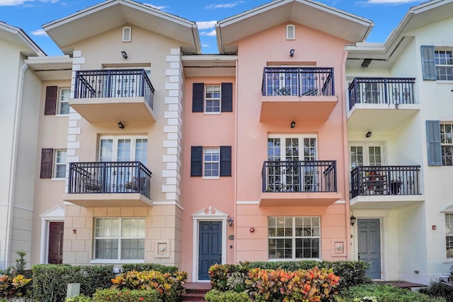 view of property featuring stucco siding