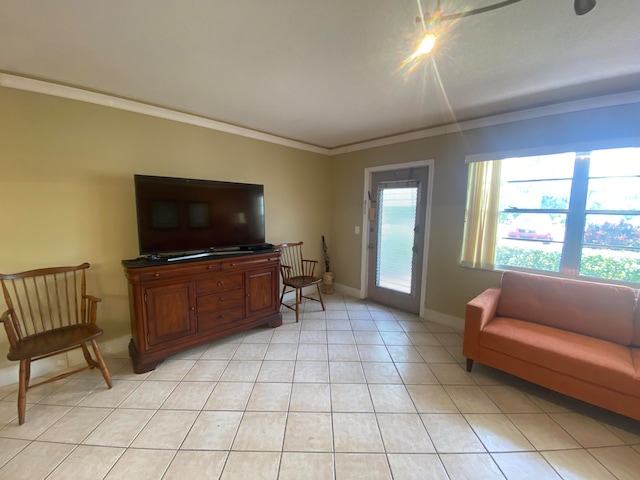 living room with light tile patterned floors and crown molding