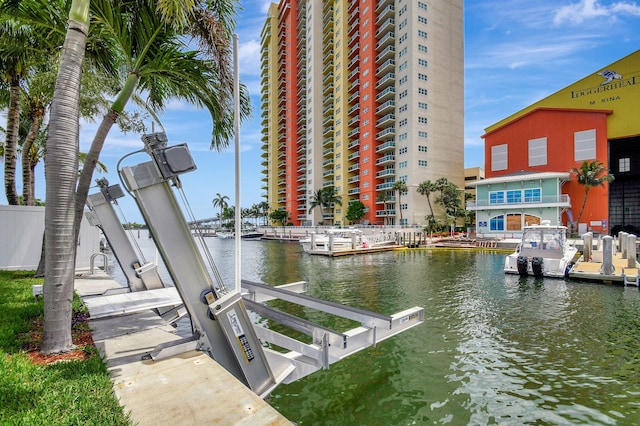 view of dock featuring a water view and boat lift