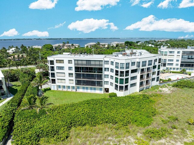 view of building exterior with a water view