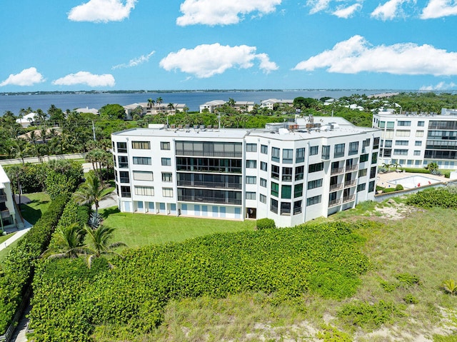 view of building exterior featuring a water view