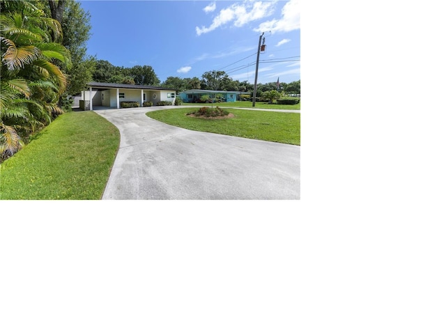 view of front of home with a front yard