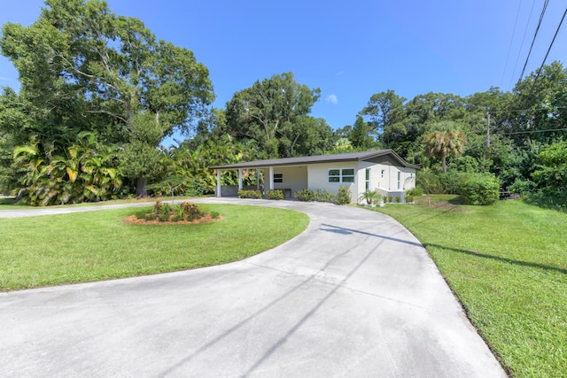 single story home with a front yard