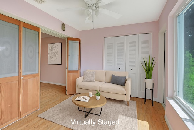5020 Petal Pl Unit D, Delray Beach, FL 33484 - living room featuring light wood-style floors and a ceiling fan