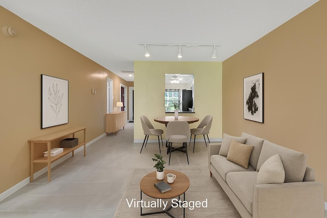 5020 Petal Pl Unit D, Delray Beach, FL 33484 - living area with track lighting, a ceiling fan, and light tile patterned floors