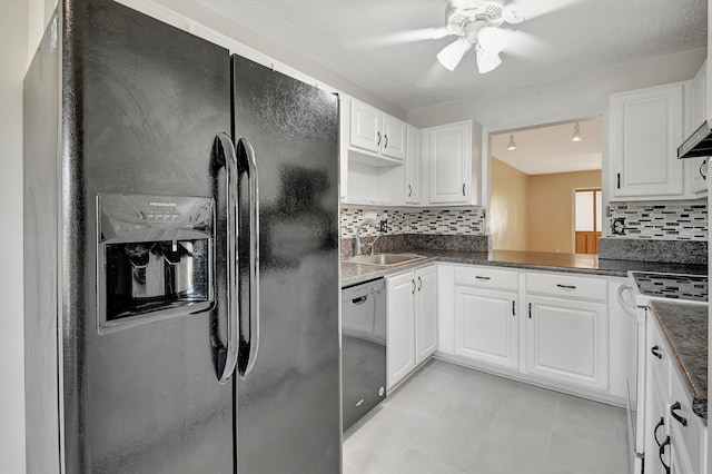 kitchen featuring sink, tasteful backsplash, black fridge with ice dispenser, white cabinetry, and white range