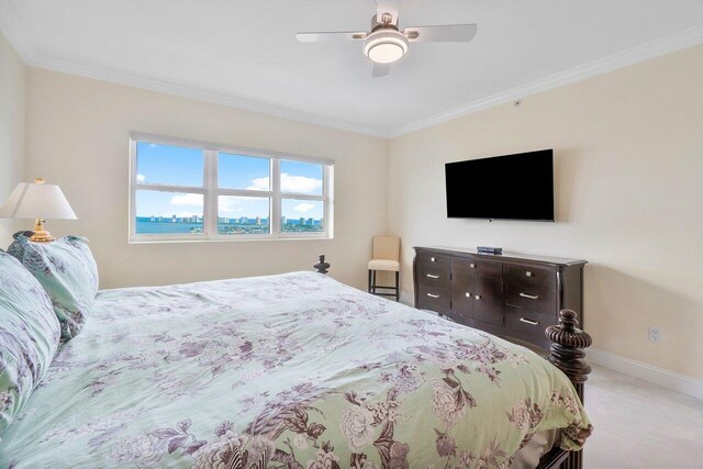 bedroom with crown molding and ceiling fan