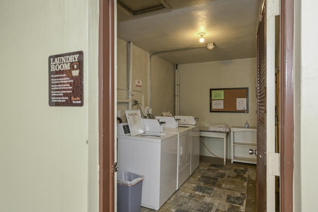 washroom with washer and clothes dryer