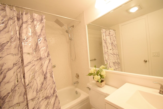 full bathroom featuring vanity, toilet, and shower / bath combo with shower curtain