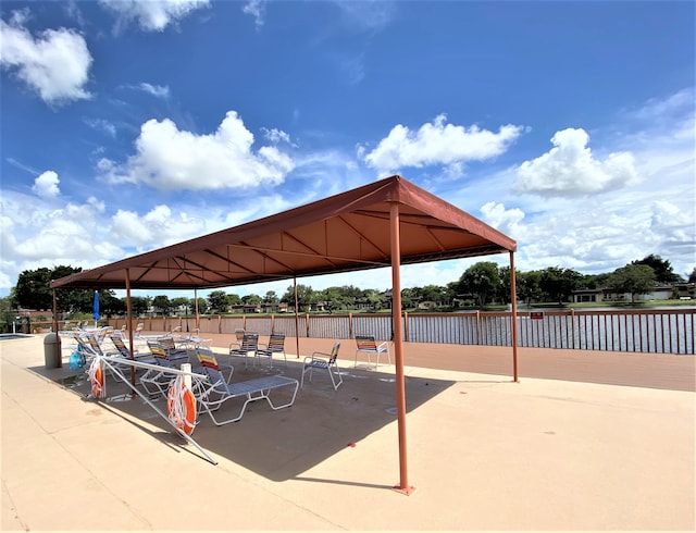 surrounding community with a gazebo and a patio area