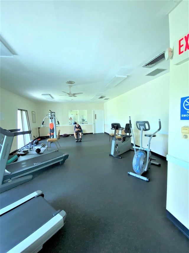 gym featuring ceiling fan