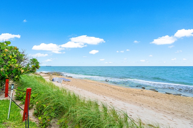 property view of water featuring a view of the beach