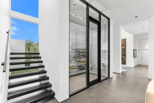 wine cellar featuring concrete floors