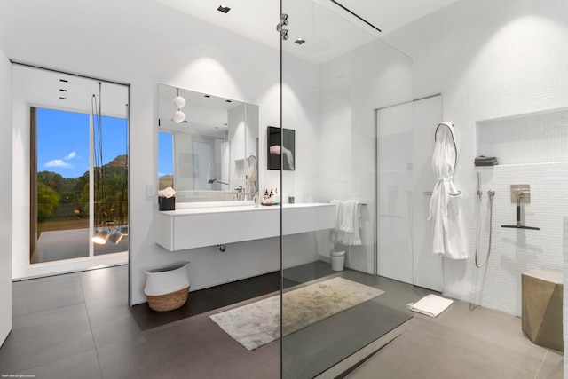 bathroom with vanity and a shower