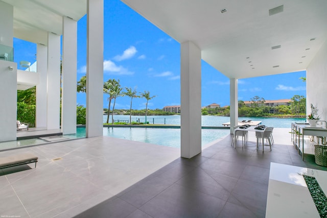 view of patio featuring a water view