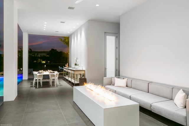 living room featuring tile patterned flooring