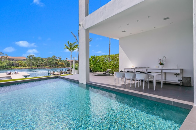 view of pool with a patio